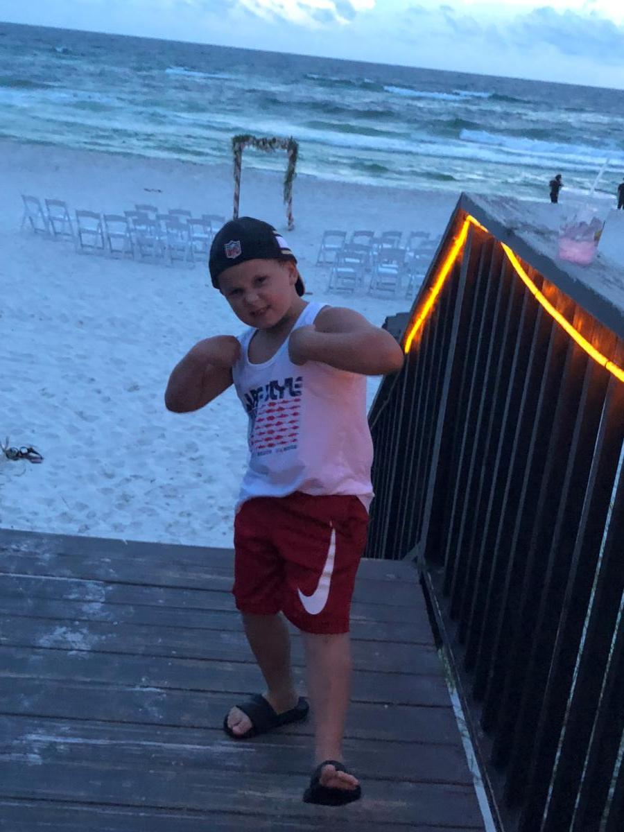 Flexing - Runaway Island Beach Bar & Grill